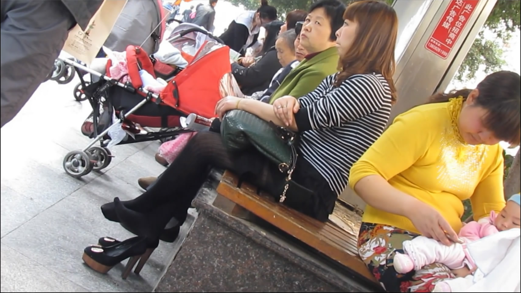 Woman with a non transparent pantyhose sits in the park